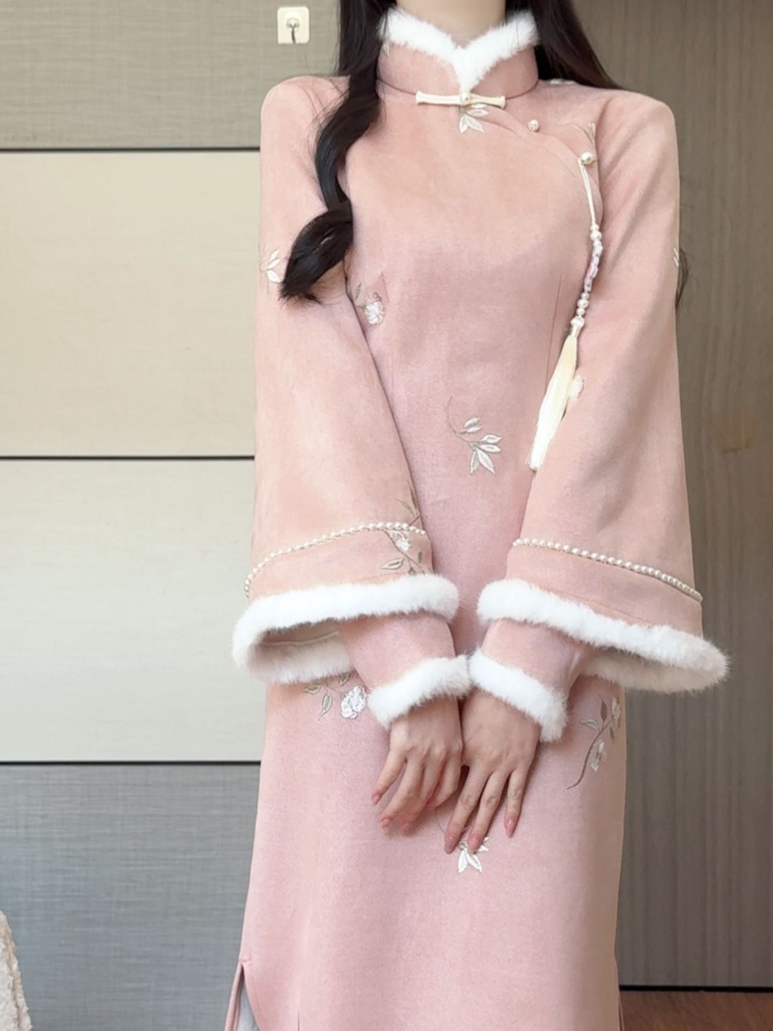 Pink fleece-lined winter qipao dress with white plush collar and cuffs, front view
