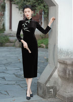Black velvet qipao dress with long sleeves and mandarin collar