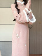 Pink winter qipao with wide plush cuffs and pearl-bead trim