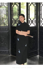 Full-length view of the plus size black embroidered qipao dress