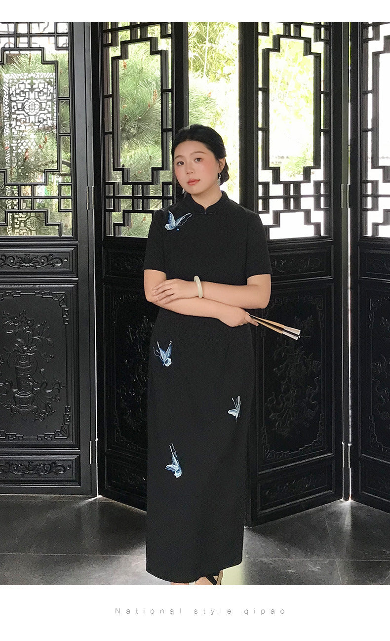 Full-length view of the plus size black embroidered qipao dress