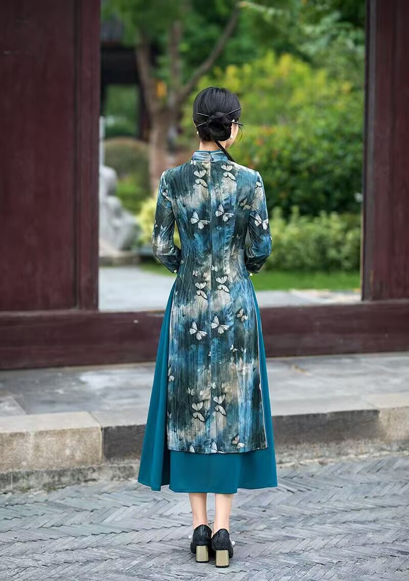 Back view of the teal velvet ao dai-inspired qipao dress