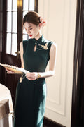 Deep green crane embroidered qipao dress, front view