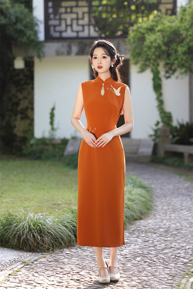 Rust orange sleeveless qipao, full length