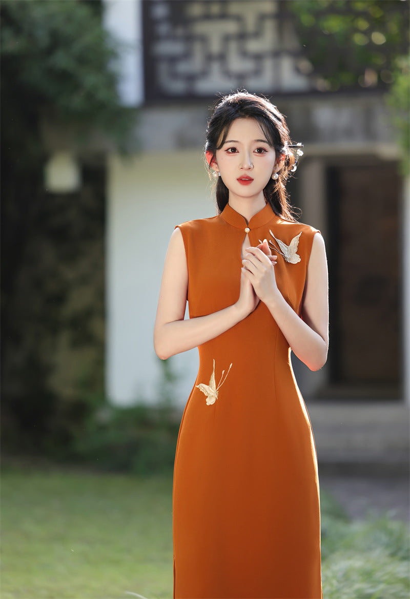 Rust orange crane embroidered qipao dress, front view