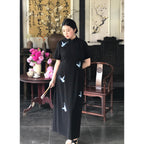Plus size black qipao dress with blue embroidered butterflies, front view