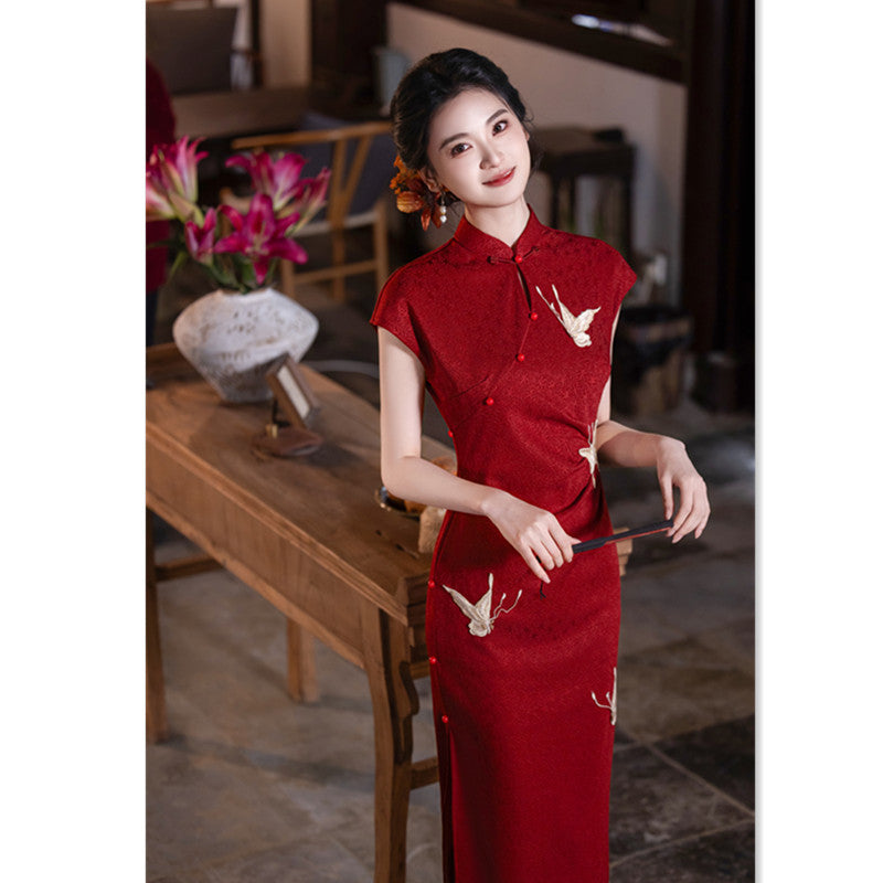 Red crane jacquard wedding qipao dress, front view