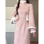 Pink winter qipao dress with tassel, side angle